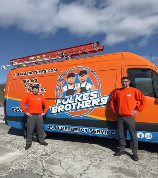 Folkes Brothers in front of van in Hopewell Junction, NY